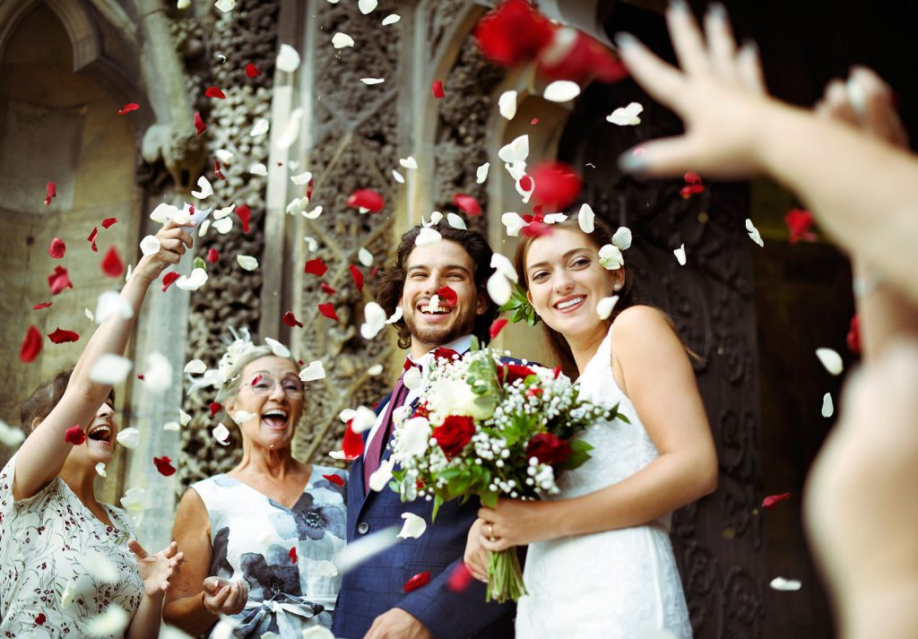 Wedding couple with confetti