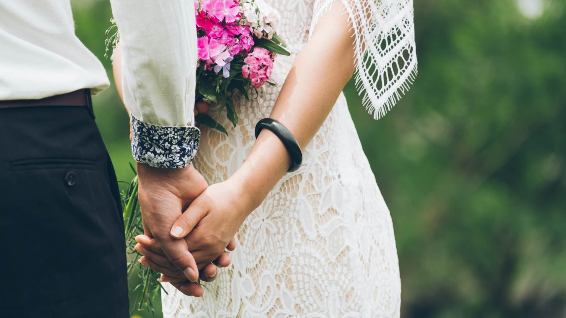 couple holding hands