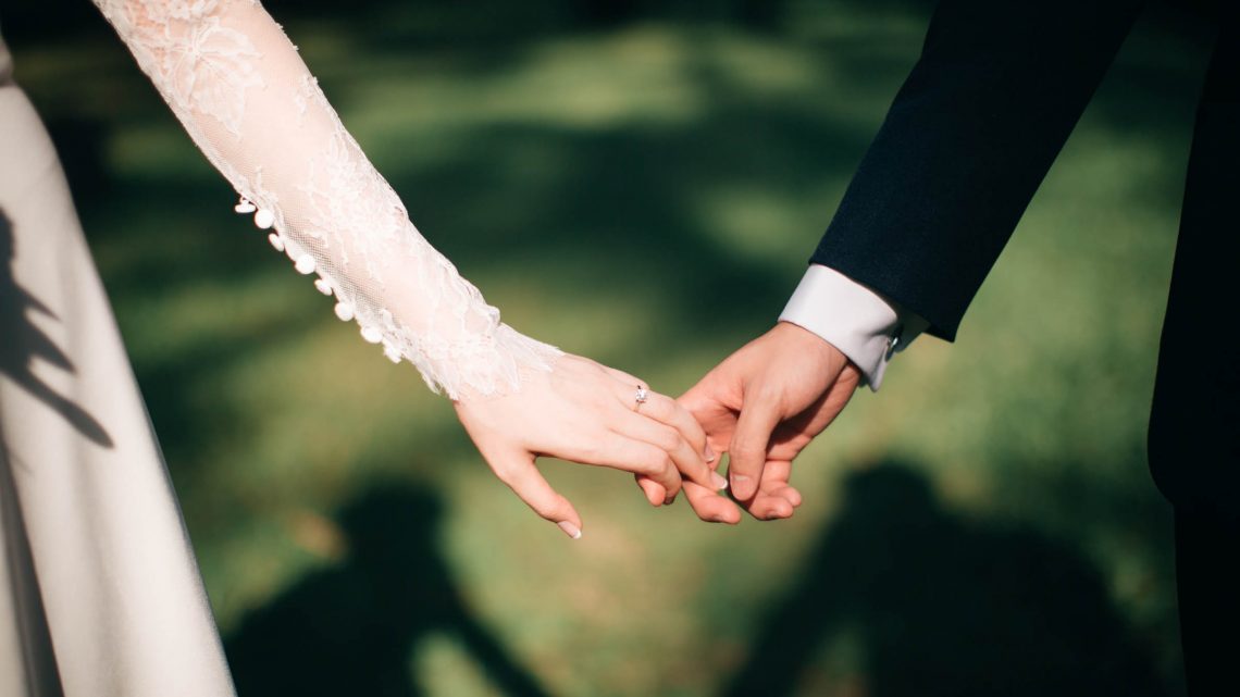 Bride and Groom holding hands, Wedding